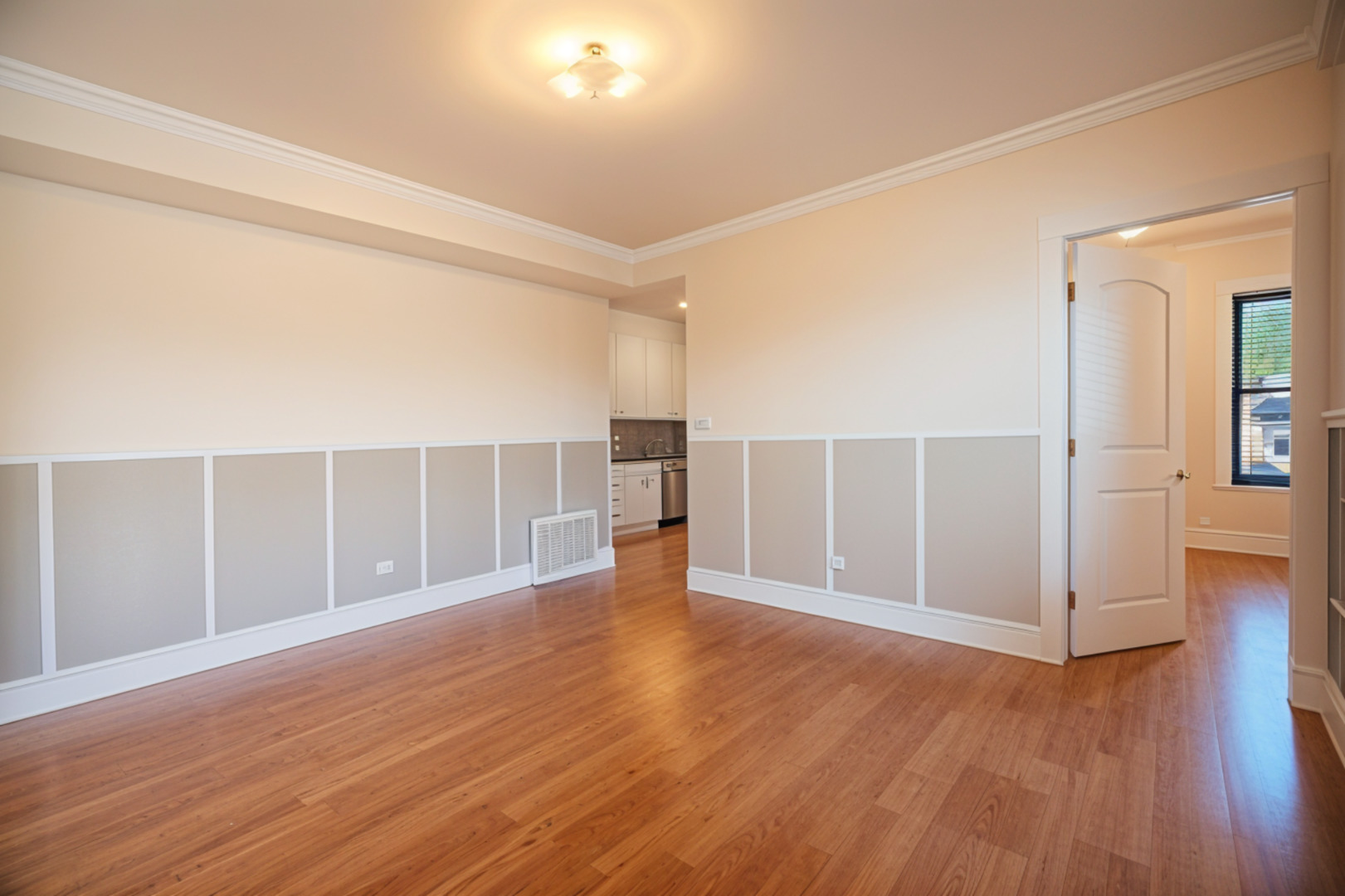 3737 North Pulaski Road, Unit 2S Chicago, IL 60641 - Photo 9 of 33 a view of an empty room with wooden floor