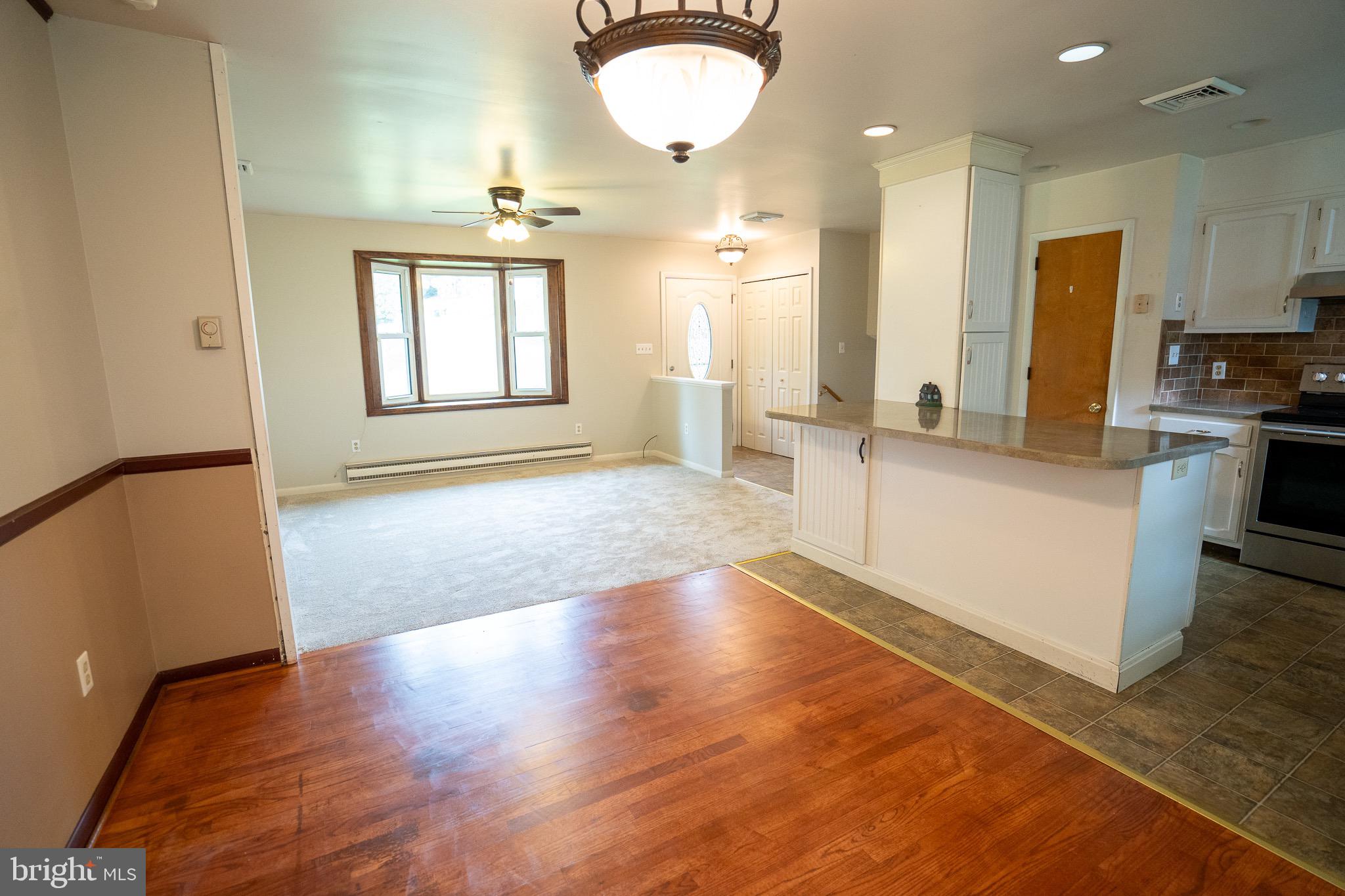 8 Sherri Lane Lititz, PA 17543 - Photo 13 of 43 a view of a kitchen with a sink and a refrigerator