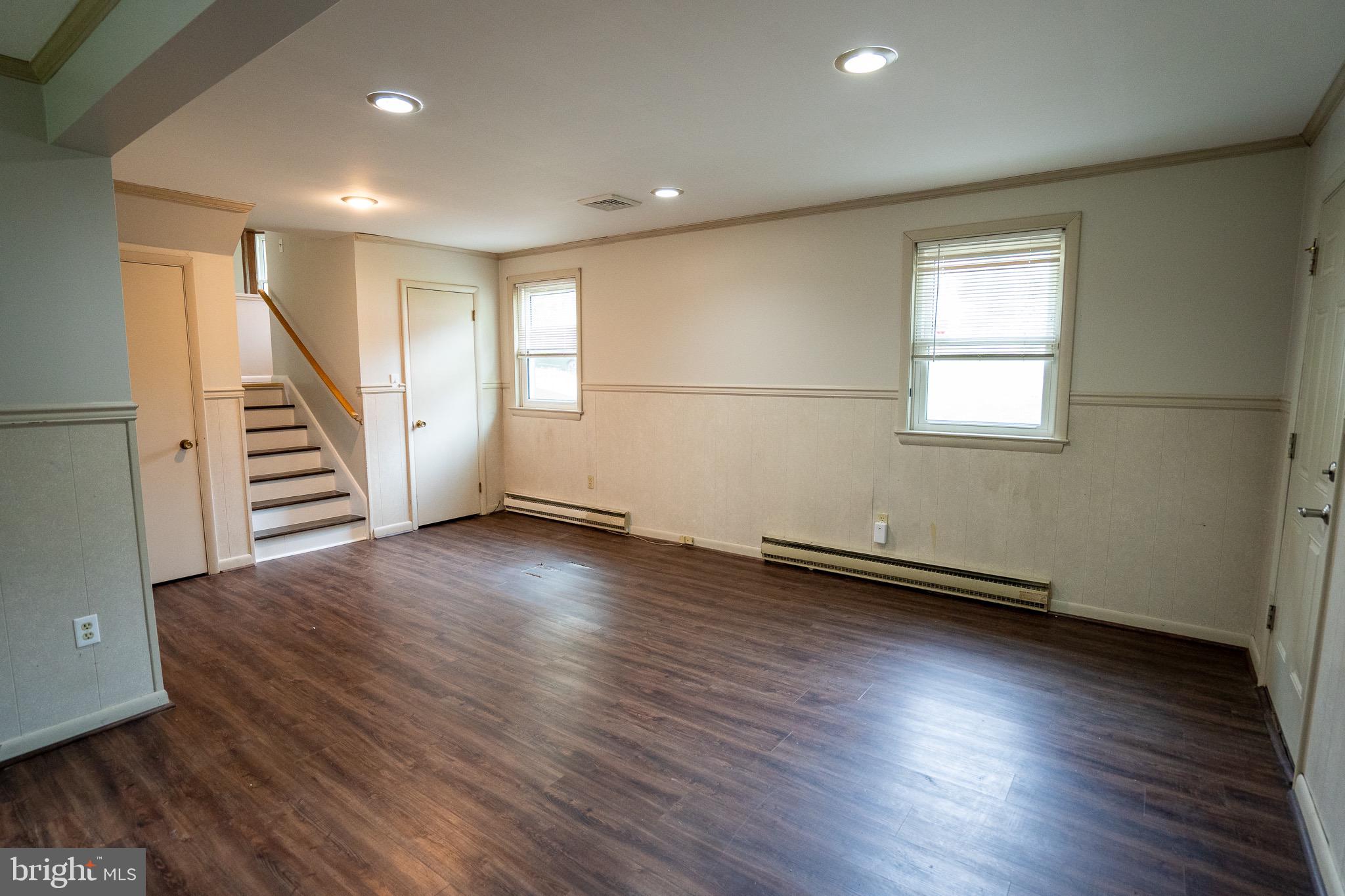 8 Sherri Lane Lititz, PA 17543 - Photo 29 of 43 an empty room with wooden floor and windows