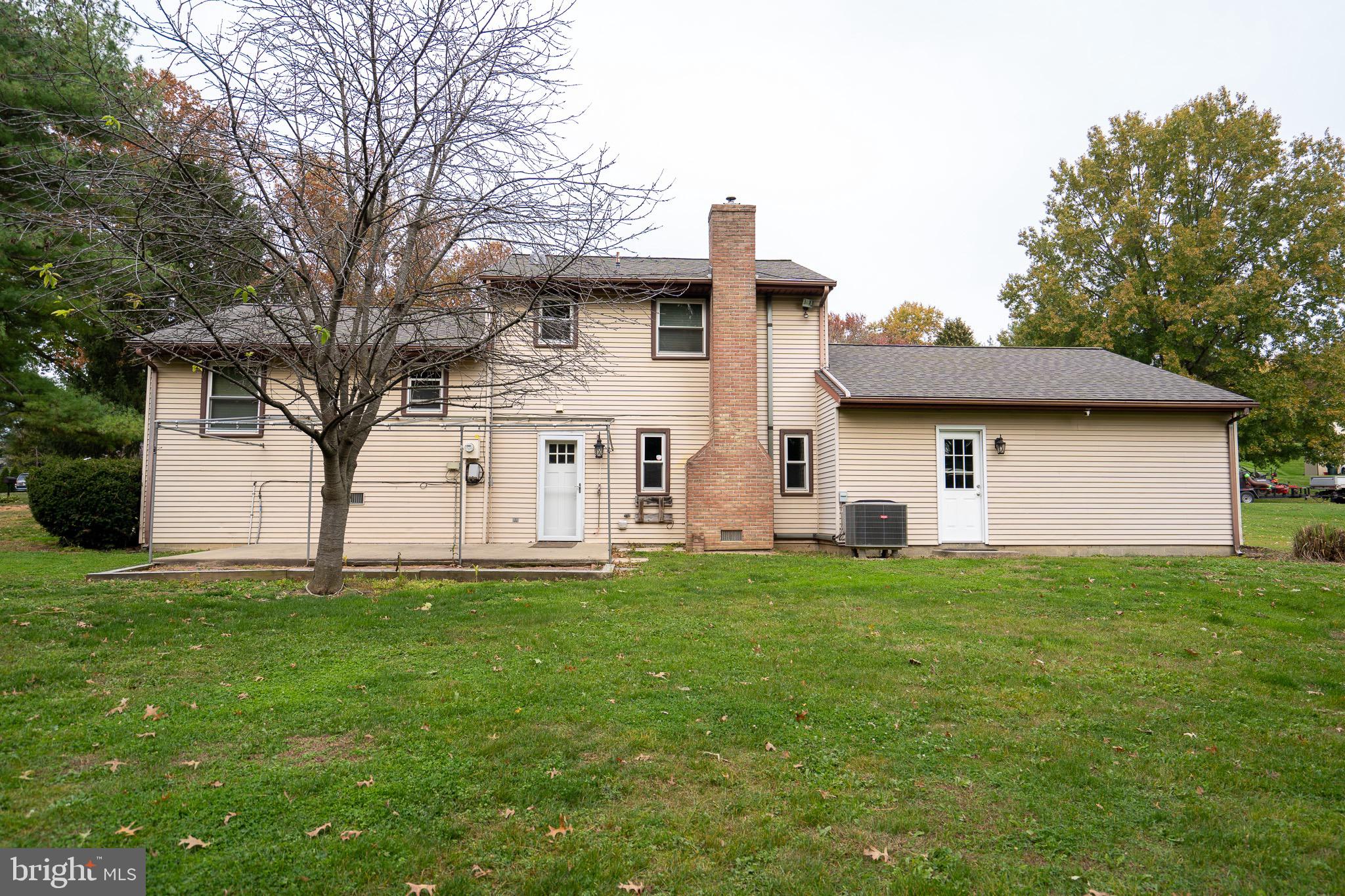 8 Sherri Lane Lititz, PA 17543 - Photo 36 of 43 a front view of a house with a garden
