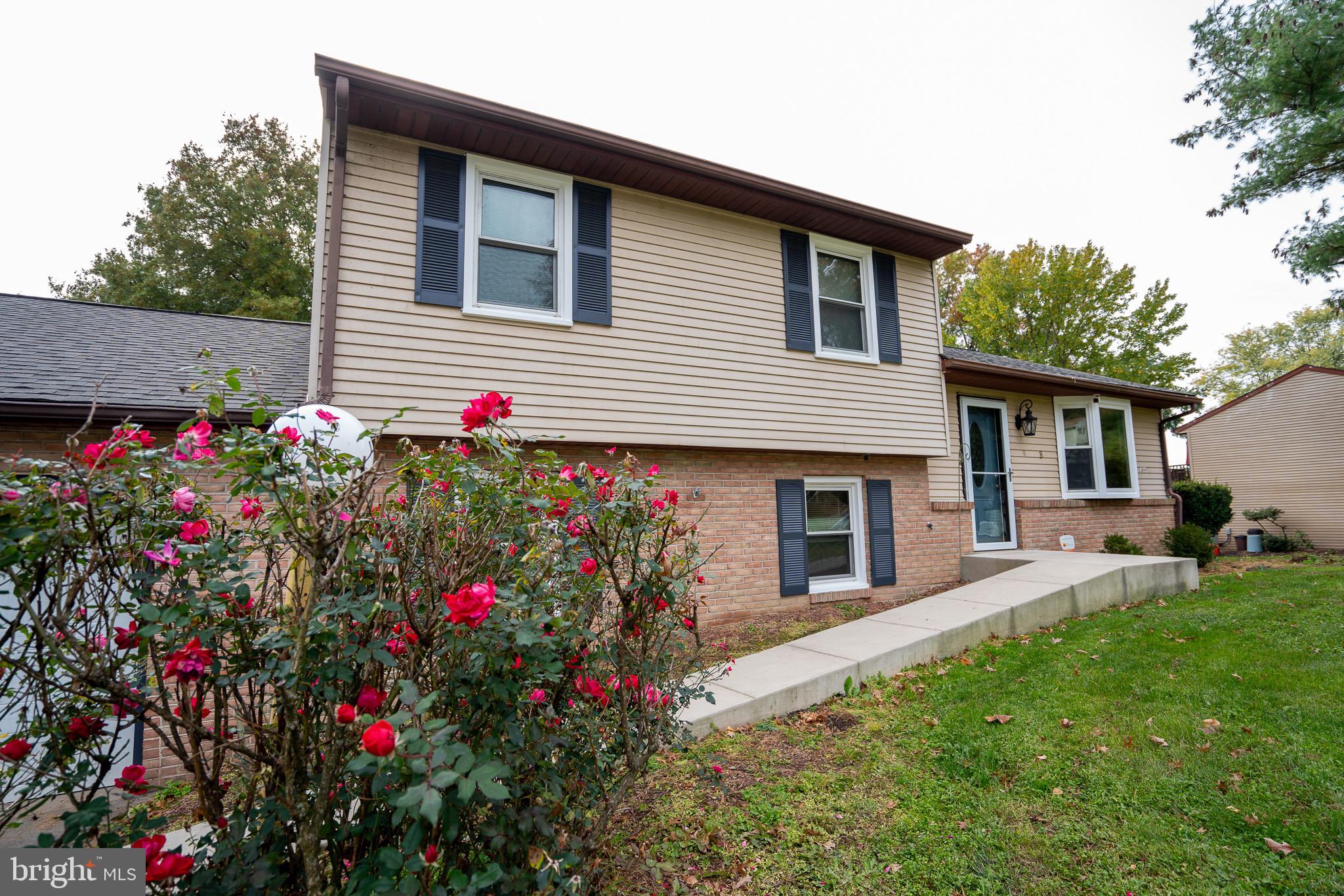 8 Sherri Lane Lititz, PA 17543 - Photo 4 of 43 a house view with a backyard space