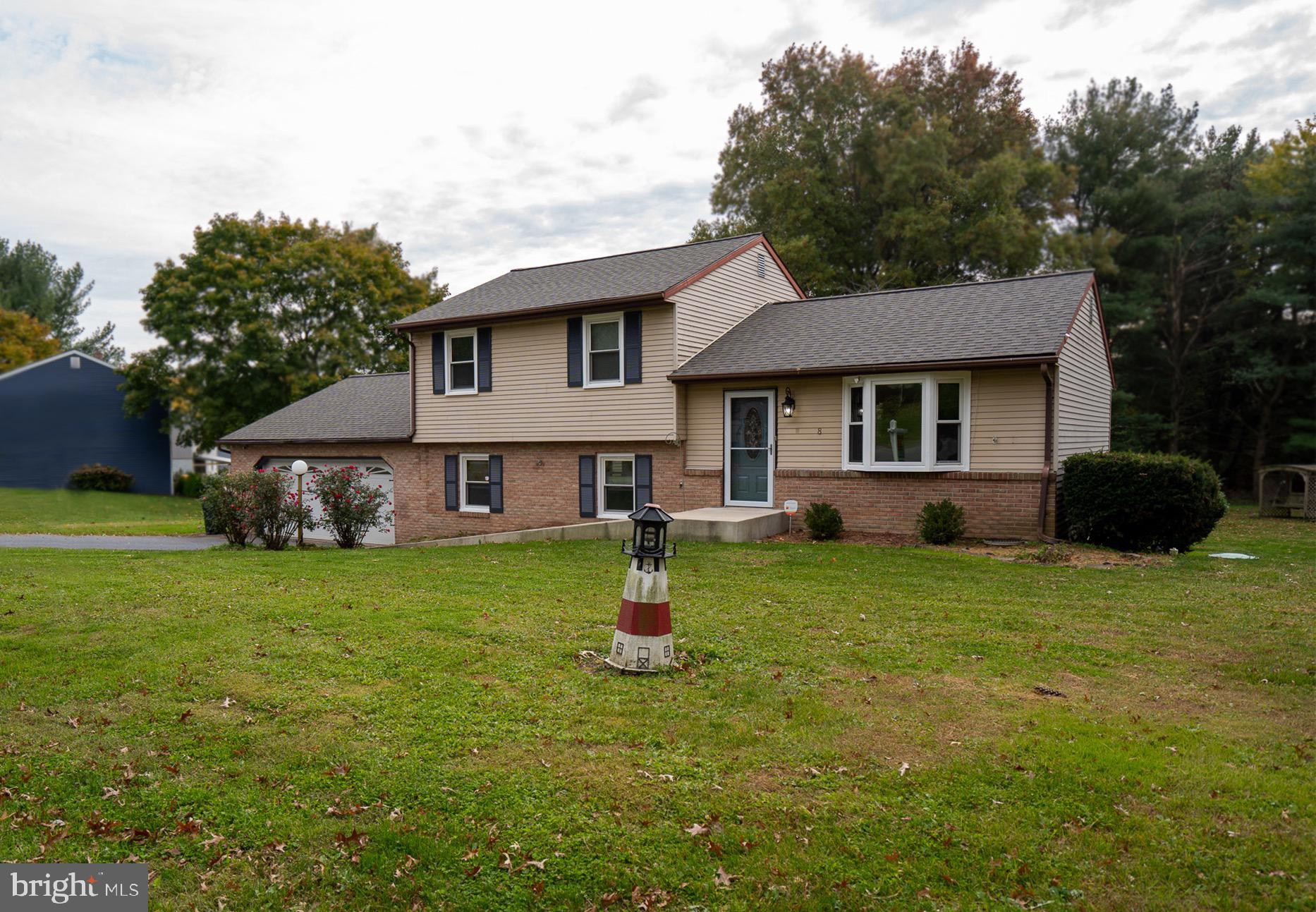 8 Sherri Lane Lititz, PA 17543 - Photo 7 of 43 a house view with a garden space