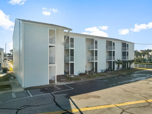 a view of a building with a patio