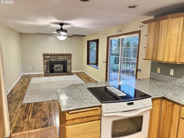 a kitchen with a stove and a sink