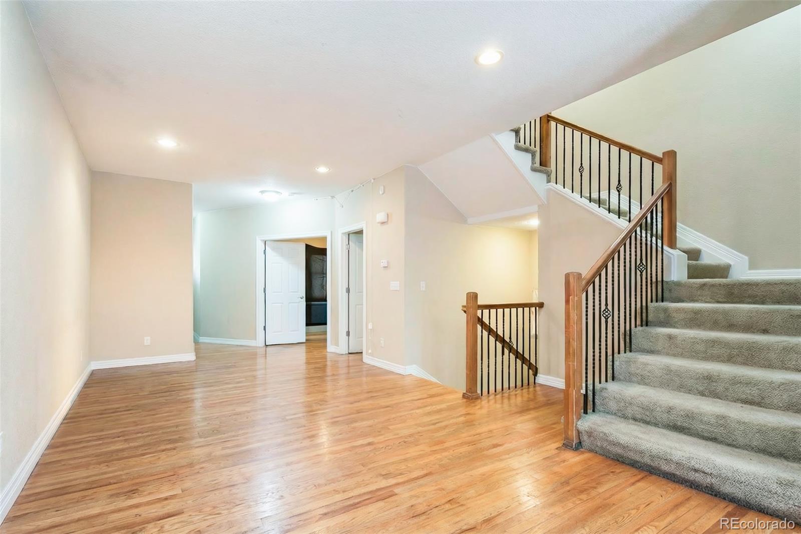 2245 South High Street Denver, CO 80210 - Photo 1 of 33 a view of an entryway with wooden floor
