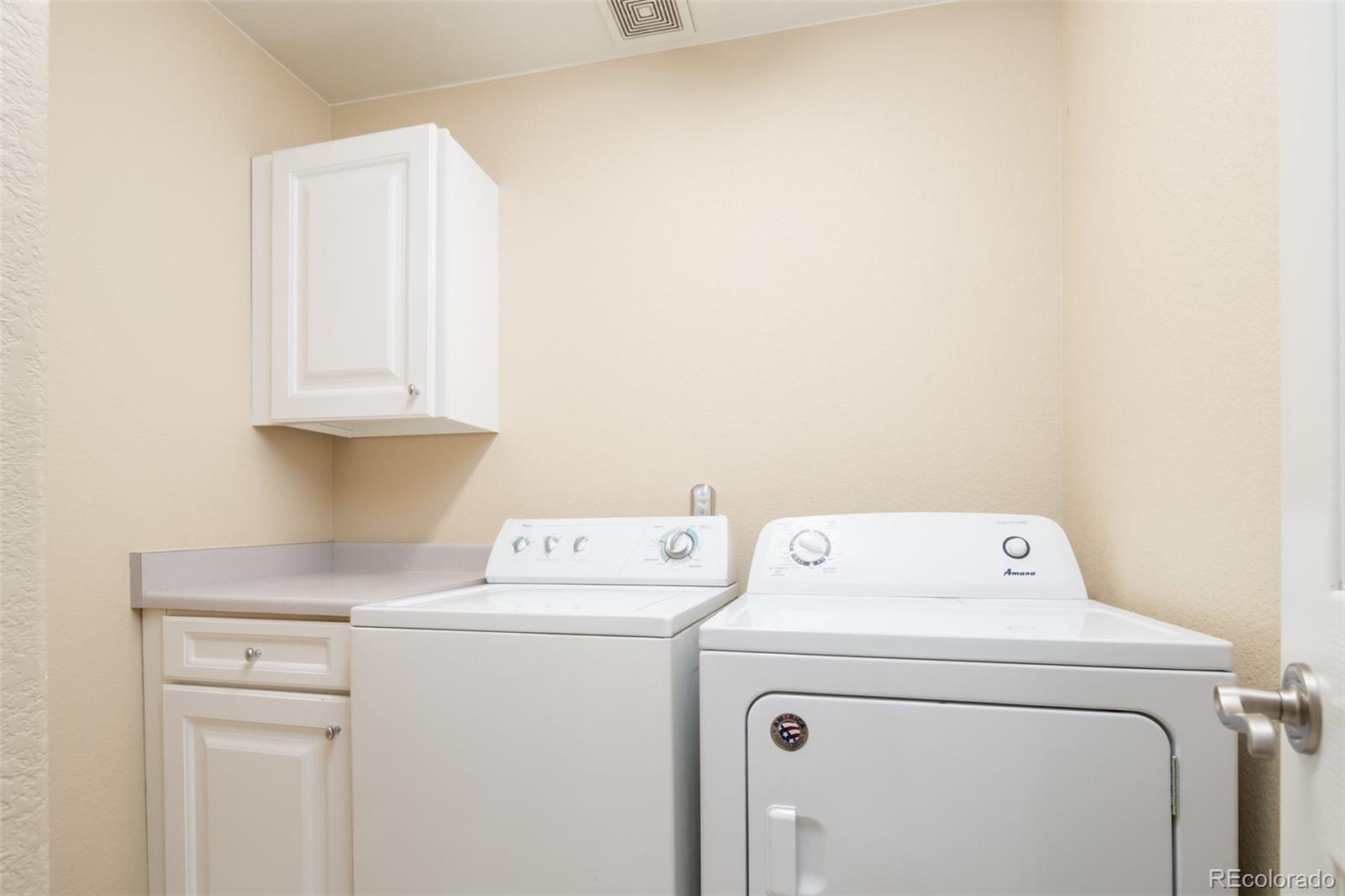 2245 South High Street Denver, CO 80210 - Photo 15 of 33 a utility room with dryer and washer