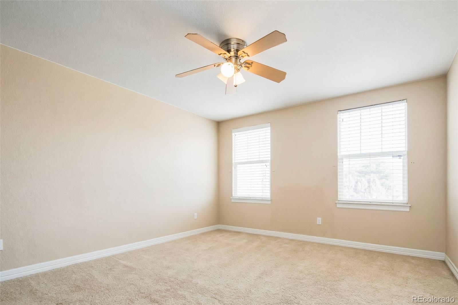 2245 South High Street Denver, CO 80210 - Photo 16 of 33 a view of an empty room with a window