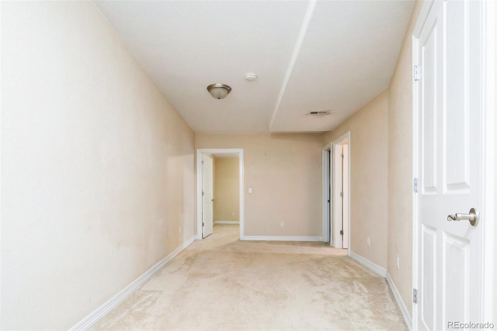 2245 South High Street Denver, CO 80210 - Photo 20 of 33 a view of a hallway