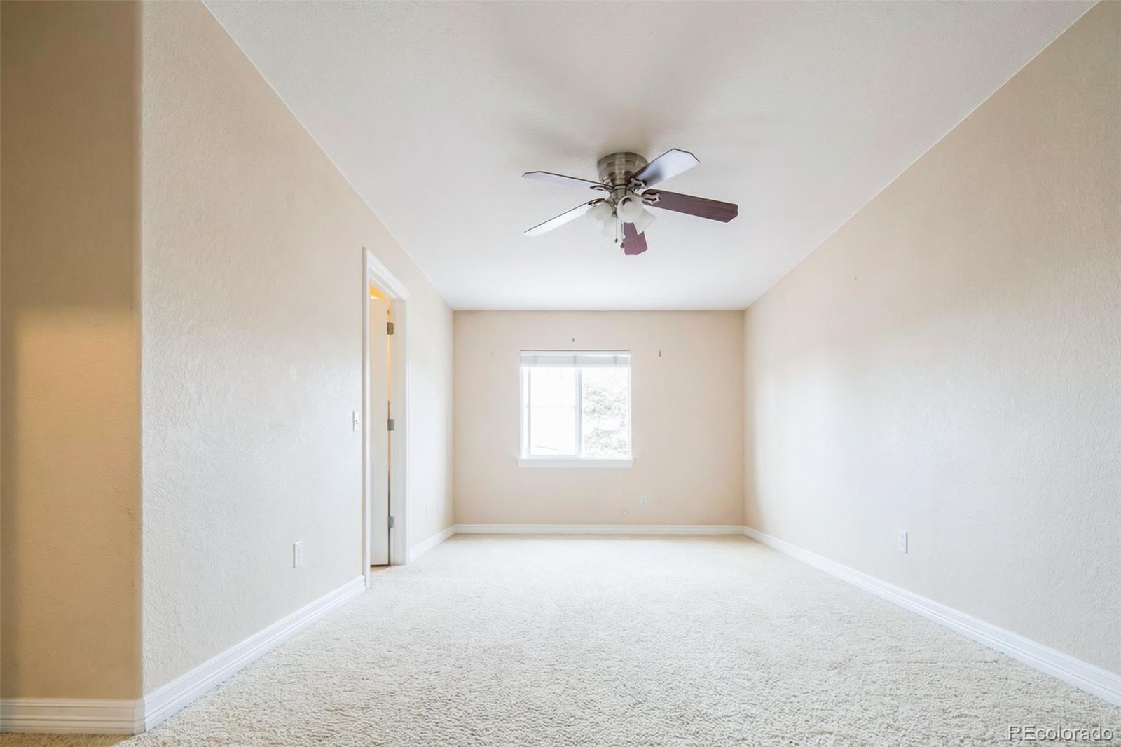 2245 South High Street Denver, CO 80210 - Photo 9 of 33 a view of an empty room with a window