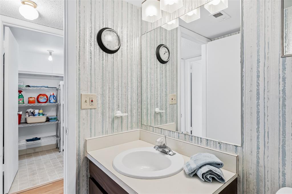 12760 Indian Rocks Road, Unit 546 Largo, FL 33774 - Photo 17 of 45 a bathroom with a sink and a mirror