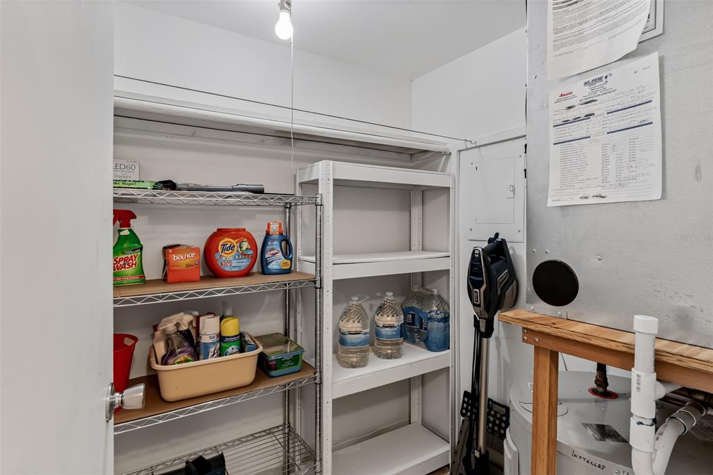 12760 Indian Rocks Road, Unit 546 Largo, FL 33774 - Photo 18 of 45 a kitchen with a refrigerator and a stove top oven