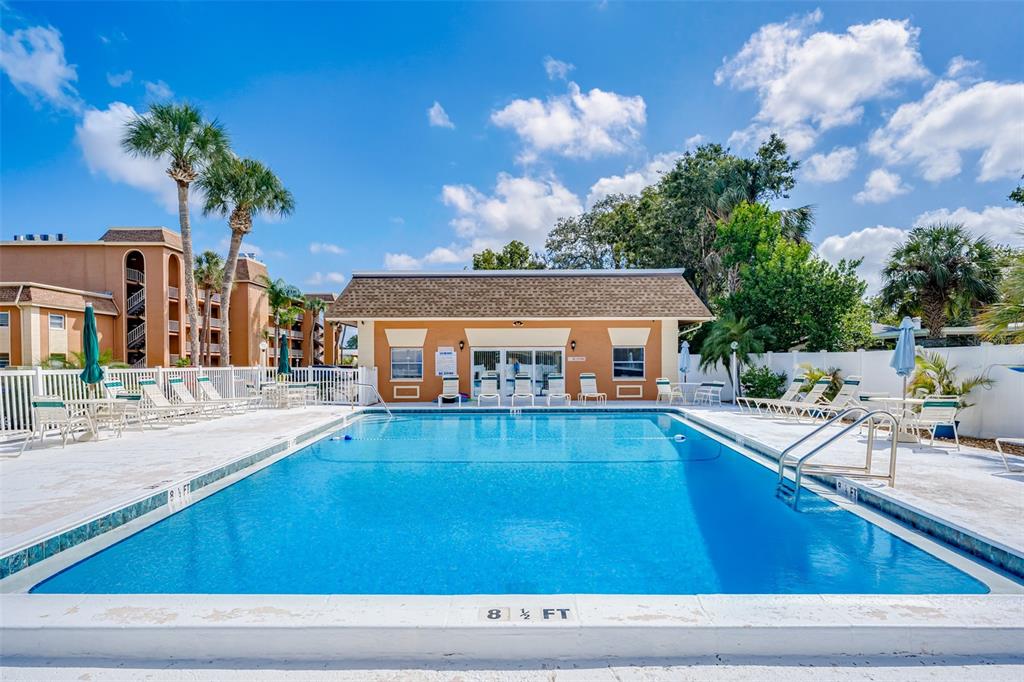 12760 Indian Rocks Road, Unit 546 Largo, FL 33774 - Photo 27 of 45 a view of a house with swimming pool