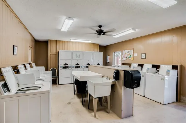 a view of living room with furniture and a window