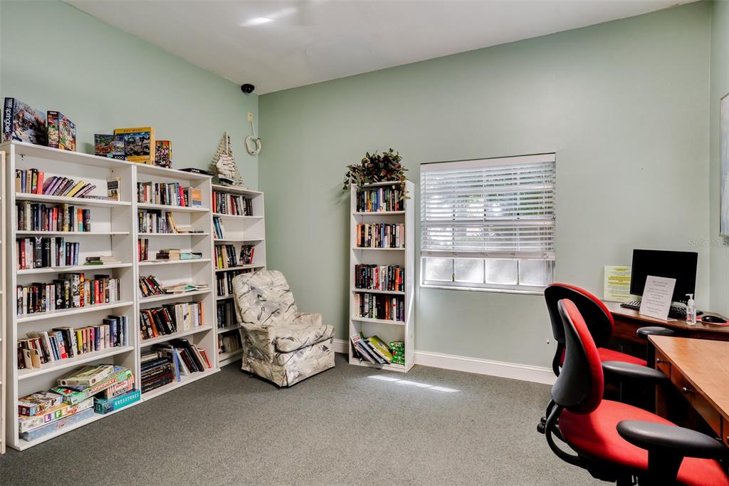 12760 Indian Rocks Road, Unit 546 Largo, FL 33774 - Photo 42 of 45 a view of a workspace with furniture and toys