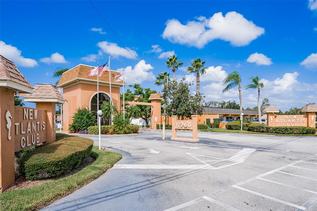 12760 Indian Rocks Road, Unit 546 Largo, FL 33774 - Photo 44 of 45 a view of a house with a yard in front of it
