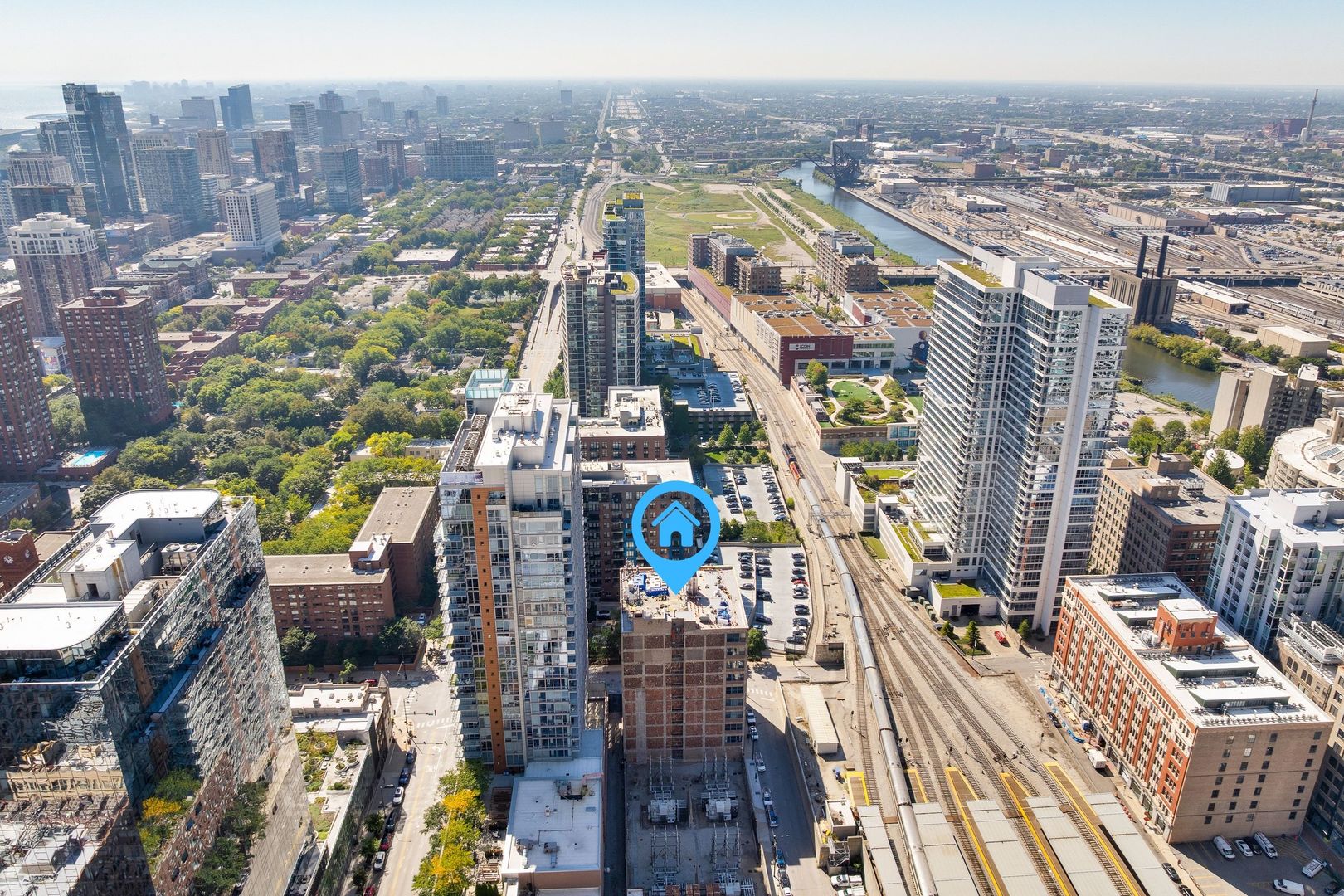 124 West Polk Street, Unit 905 Chicago, IL 60605 - Photo 24 of 28 a view of a city with tall buildings
