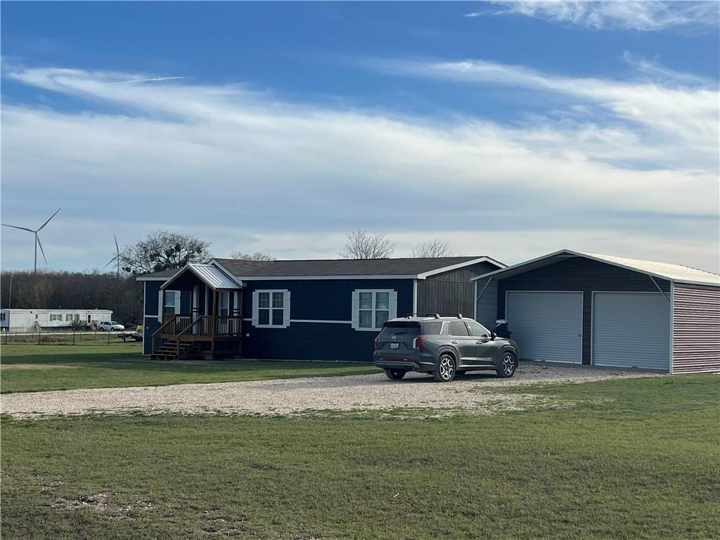 161 Meadow View Lane Hubbard, TX 76648 - Photo 2 of 16 a front view of house with yard barbeque and outdoor seating