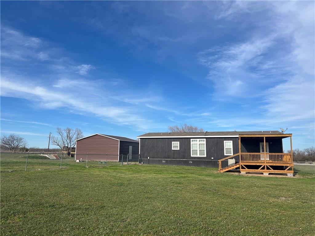 161 Meadow View Lane Hubbard, TX 76648 - Photo 3 of 16 a view of a house with a back yard