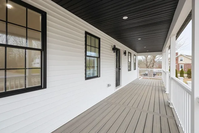 a view of backyard with a large window