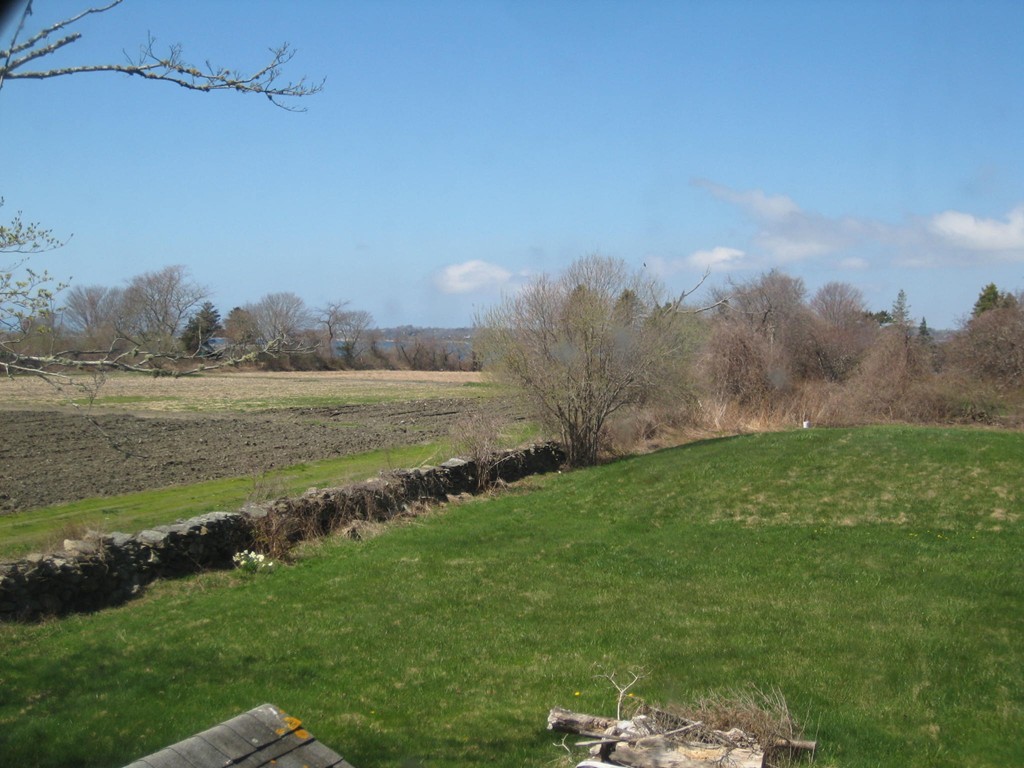 253 West Main Road Little Compton, RI 02837 - Photo 8 of 19 a view of a lake from a yard