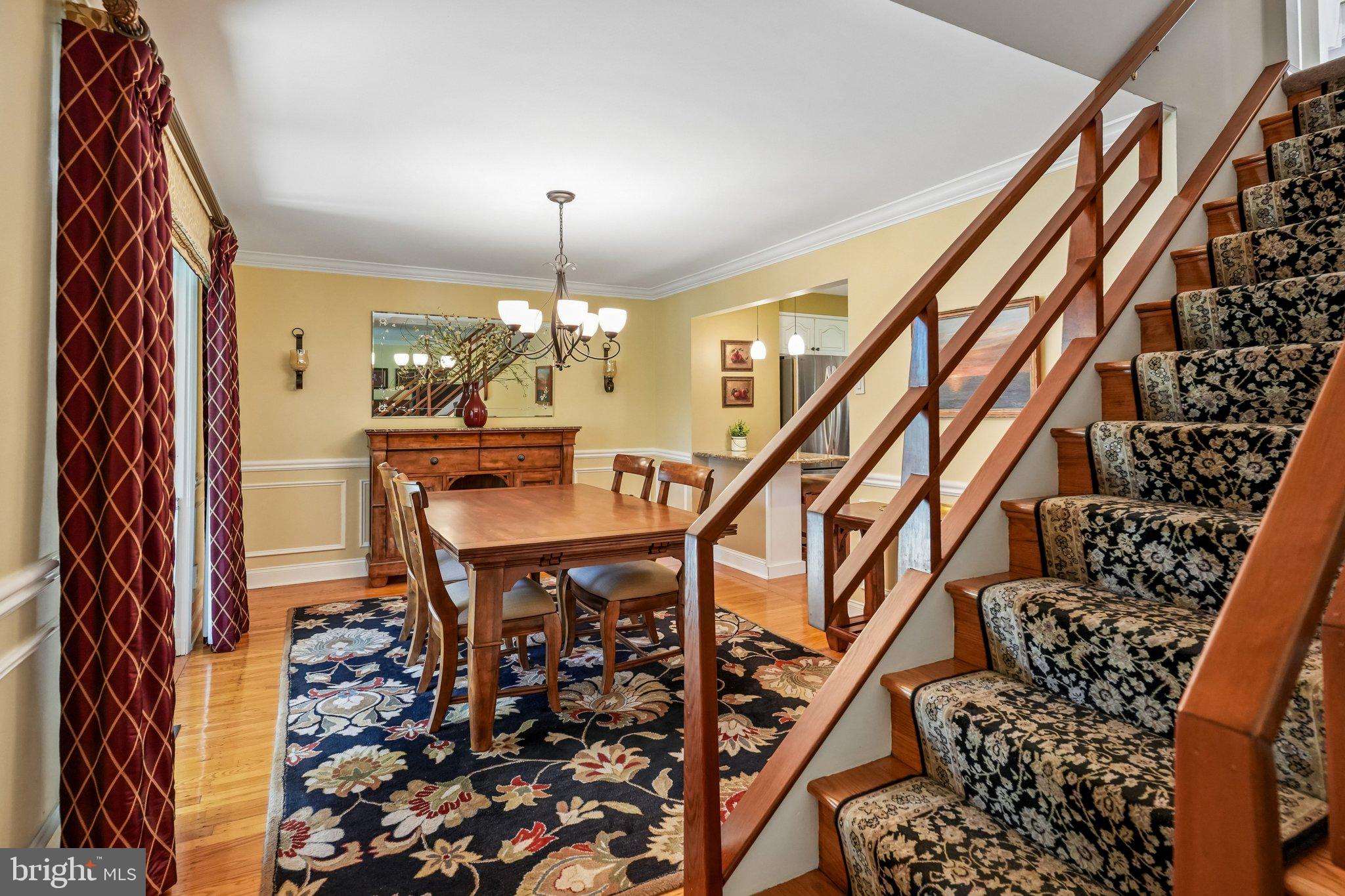 209 Upper Valley Road North Wales, PA 19454 - Photo 8 of 35 Elegant dining space with staircase charm.