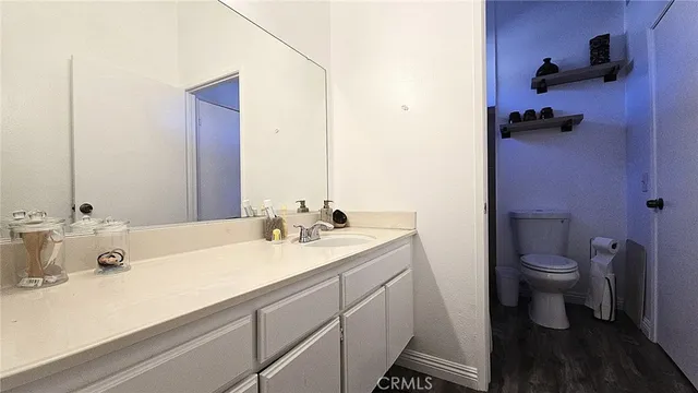 a bathroom with a sink and a toilet