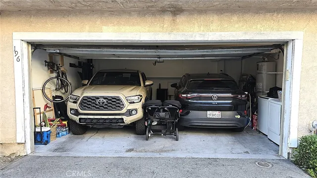 a view of a backyard with swimming pool