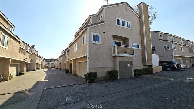 a potted plant sitting in front of a building
