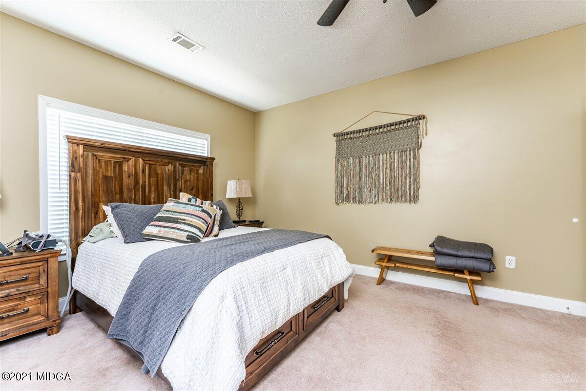 1900 Smith Road Forsyth, GA 31029 - Photo 11 of 28 a bedroom with a bed and a window