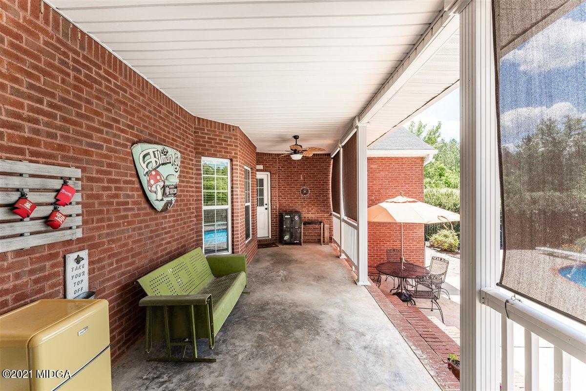 1900 Smith Road Forsyth, GA 31029 - Photo 19 of 28 a front view of a house with outdoor seating
