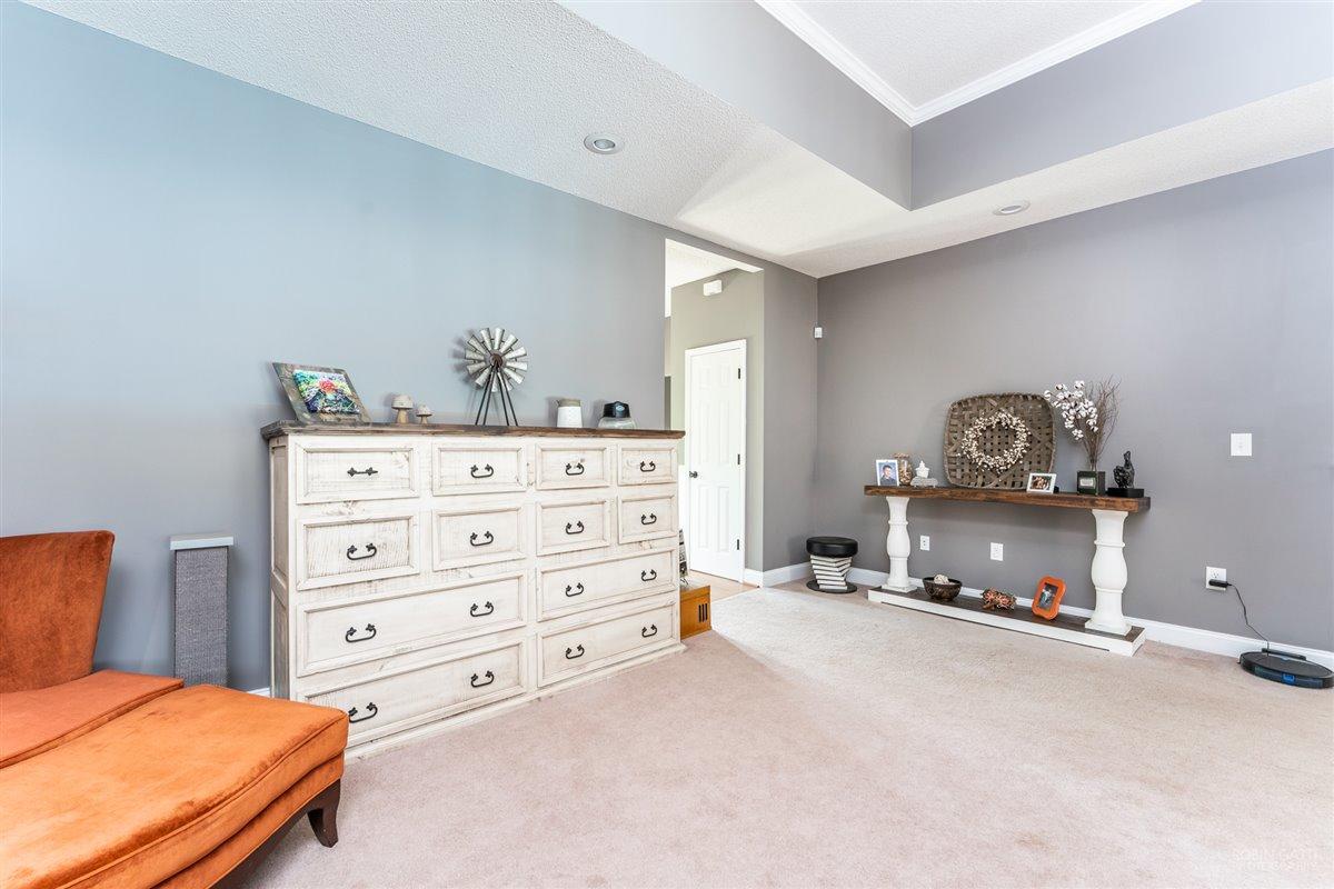 1900 Smith Road Forsyth, GA 31029 - Photo 9 of 28 a bedroom with a bed and a dresser