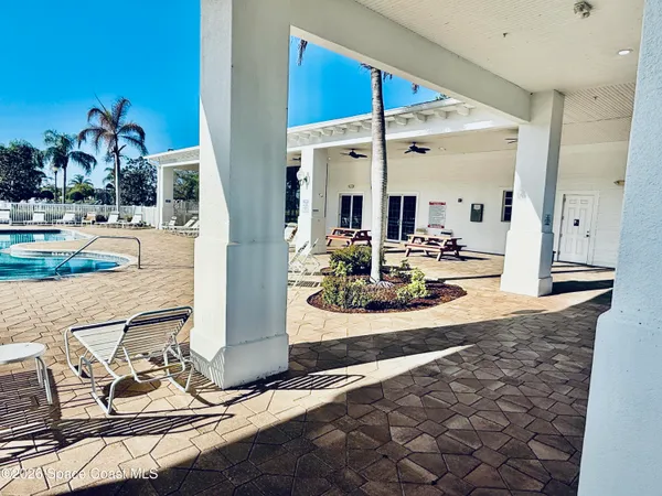 a view of a garden and basketball court