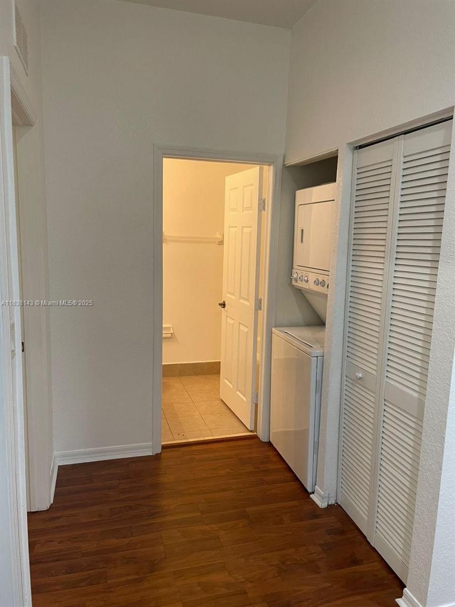 4911 Southwest 140th Terrace, Unit 6 Miramar, FL 33027 - Photo 13 of 14 a view of empty room with wooden floor and fan