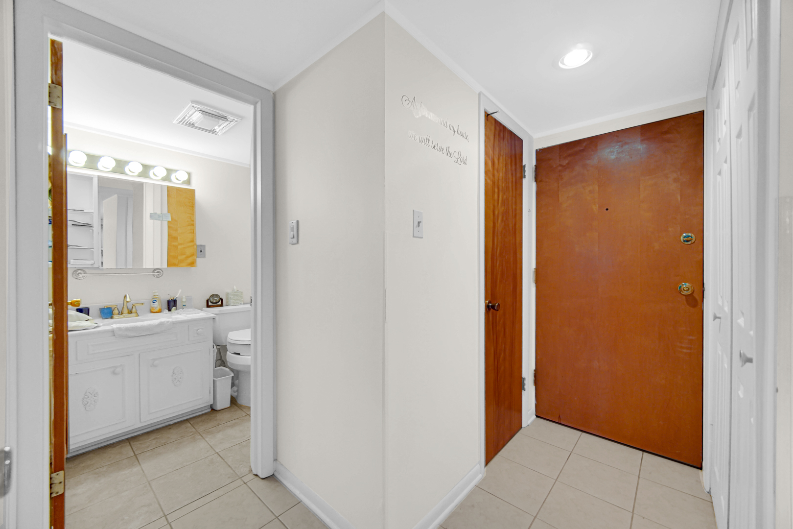 940 Holbrook Road, Unit 6A Homewood, IL 60430 - Photo 2 of 16 a bathroom with a granite countertop sink and a mirror