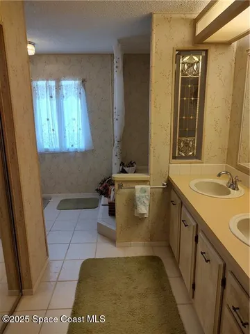 $215,000 | 451 Papaya Circle, Barefoot Bay, FL 32976