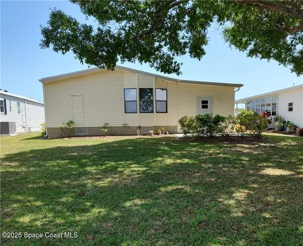 $215,000 | 451 Papaya Circle, Barefoot Bay, FL 32976