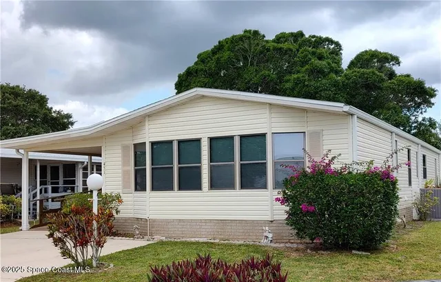 $215,000 | 451 Papaya Circle, Barefoot Bay, FL 32976