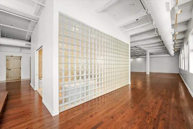 a view of entryway with wooden floor