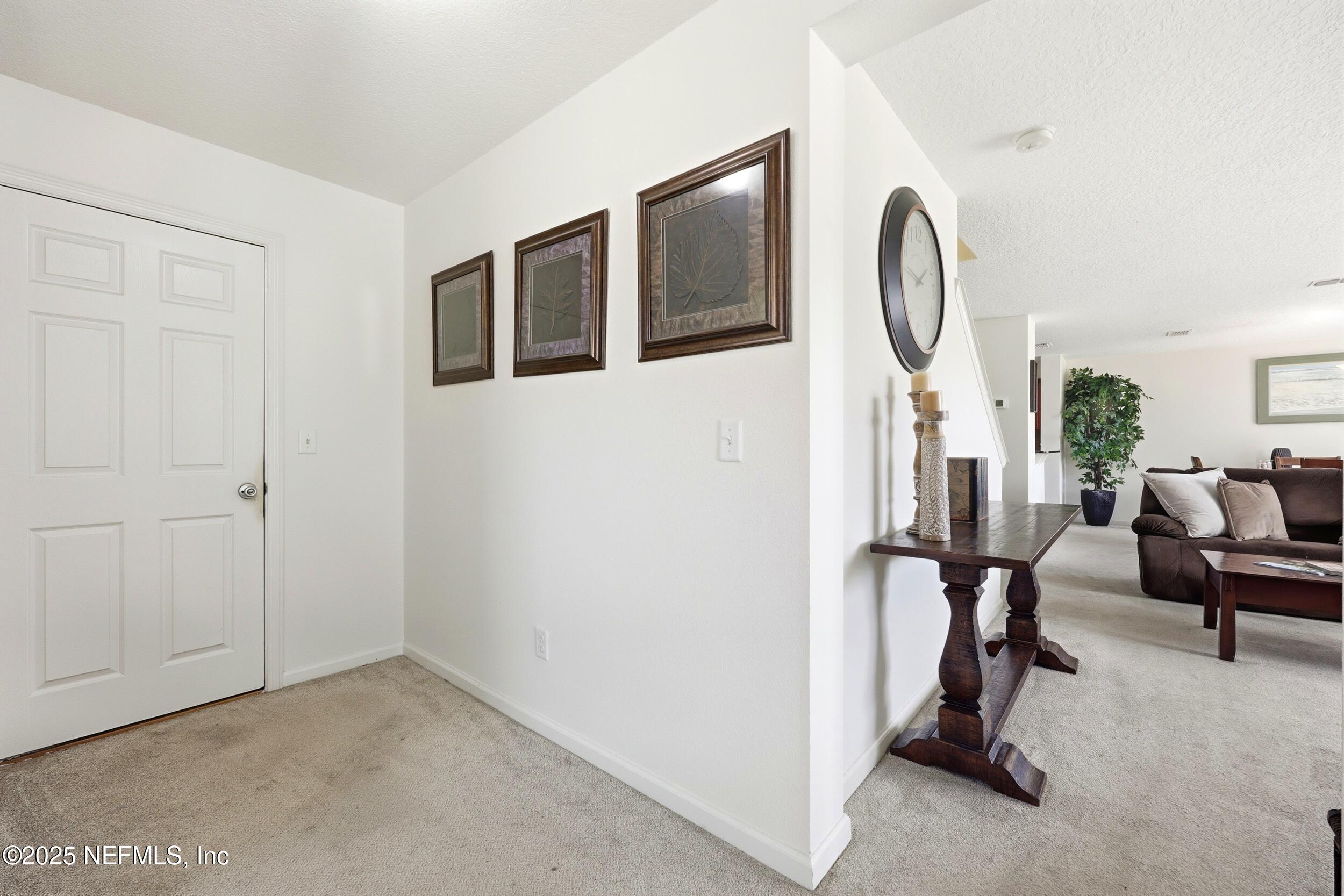 7478 Steventon Way Jacksonville, FL 32244 - Photo 10 of 26 a view of livingroom with furniture and windows