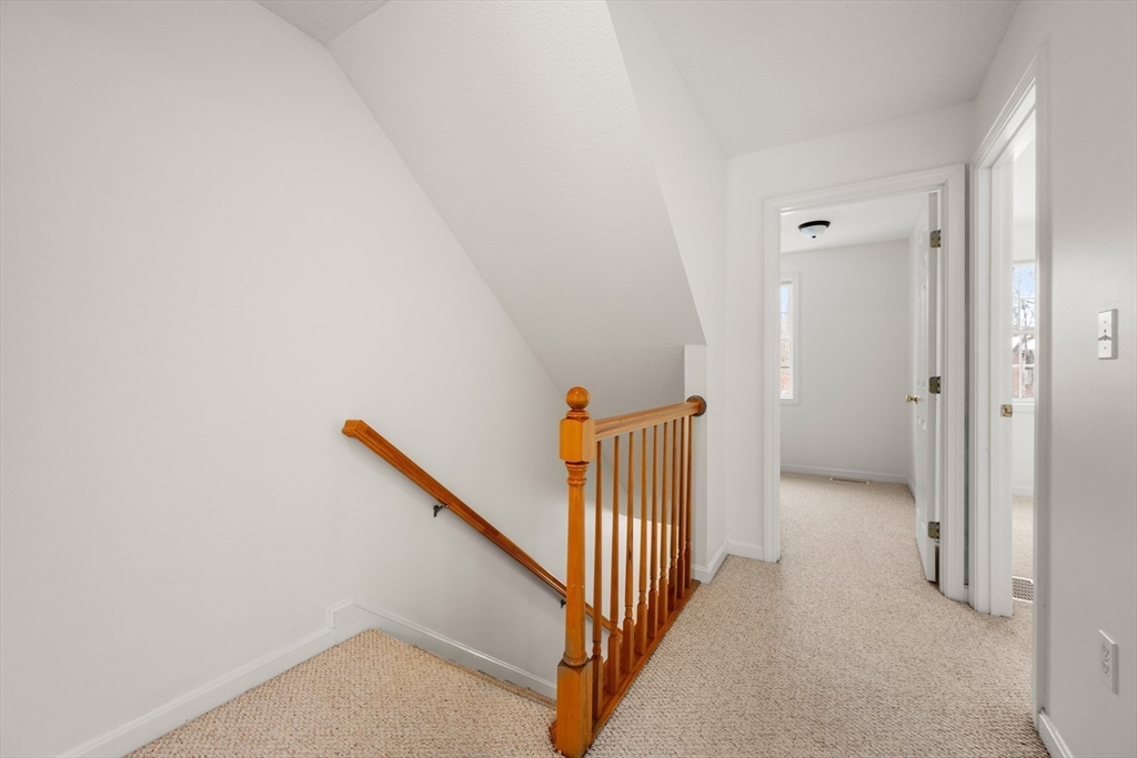 181 High Street, Unit 1 Andover, MA 01810 - Photo 16 of 21 a view of a hallway with stairs