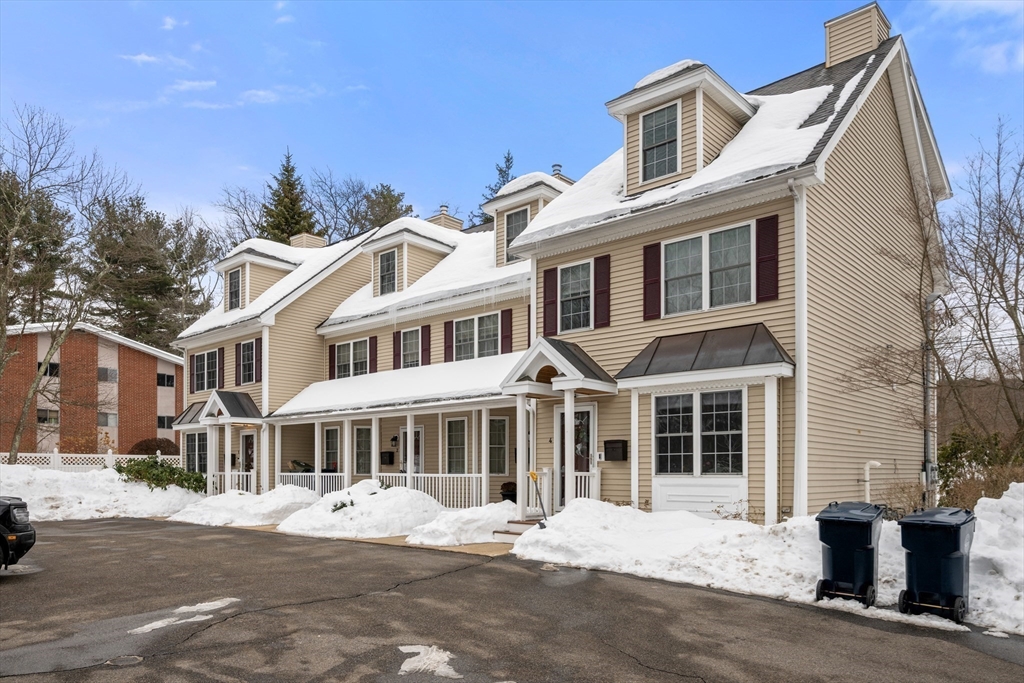 181 High Street, Unit 1 Andover, MA 01810 - Photo 21 of 21 a front view of a building with a garden