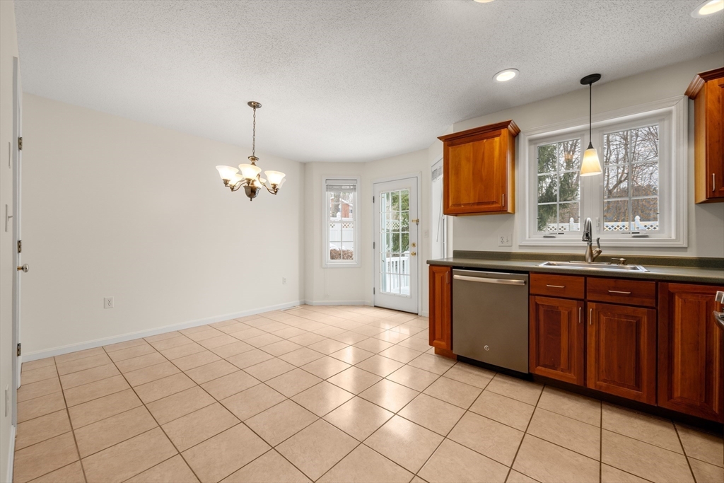 181 High Street, Unit 1 Andover, MA 01810 - Photo 7 of 21 a bathroom with a sink a vanity and a mirror