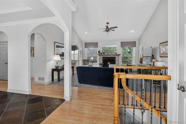 a view of a living room and kitchen