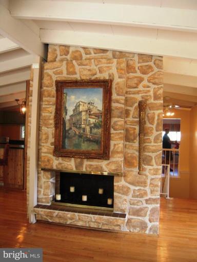 6707 Queens Ferry Road Baltimore, MD 21239 - Photo 15 of 23 a view of a fireplace