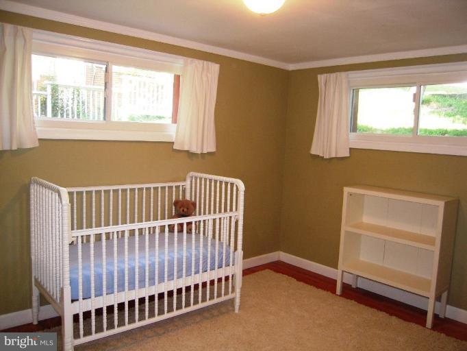 6707 Queens Ferry Road Baltimore, MD 21239 - Photo 4 of 23 a view of an empty room with a window
