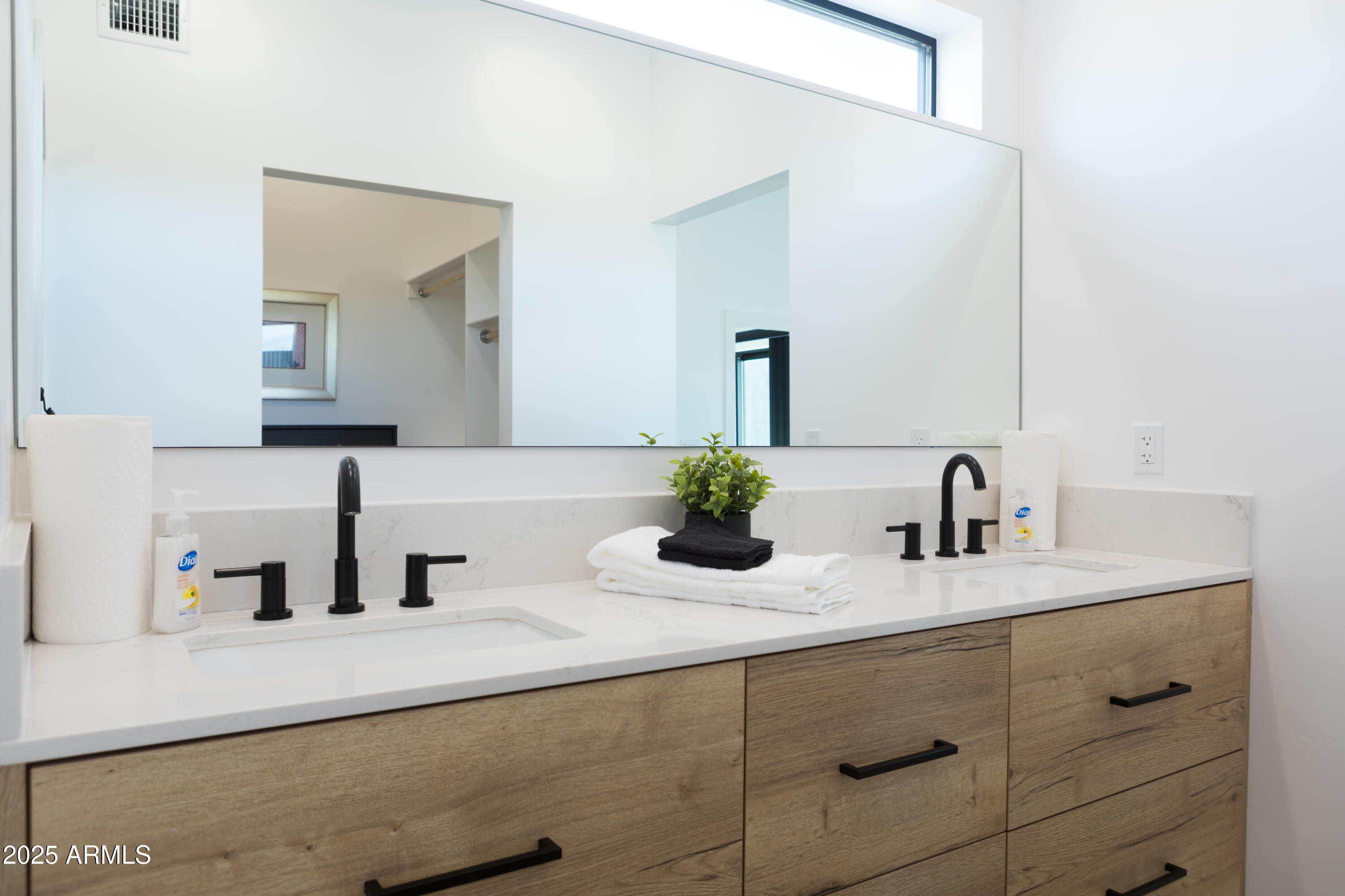 302 West Culver Street, Unit 3 Phoenix, AZ 85003 - Photo 14 of 21 a bathroom with a sink and a mirror