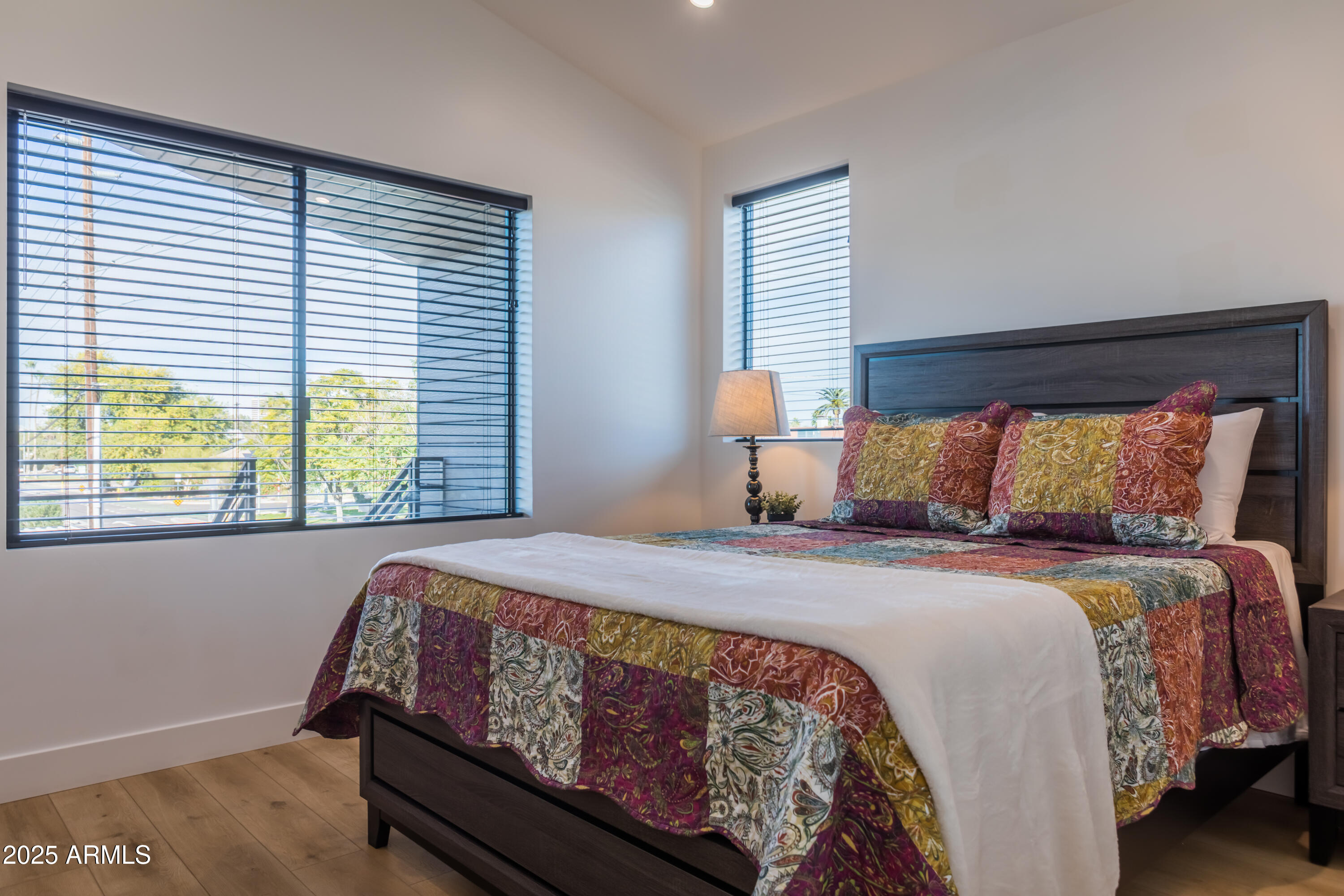 302 West Culver Street, Unit 3 Phoenix, AZ 85003 - Photo 16 of 21 a bedroom with a bed and window