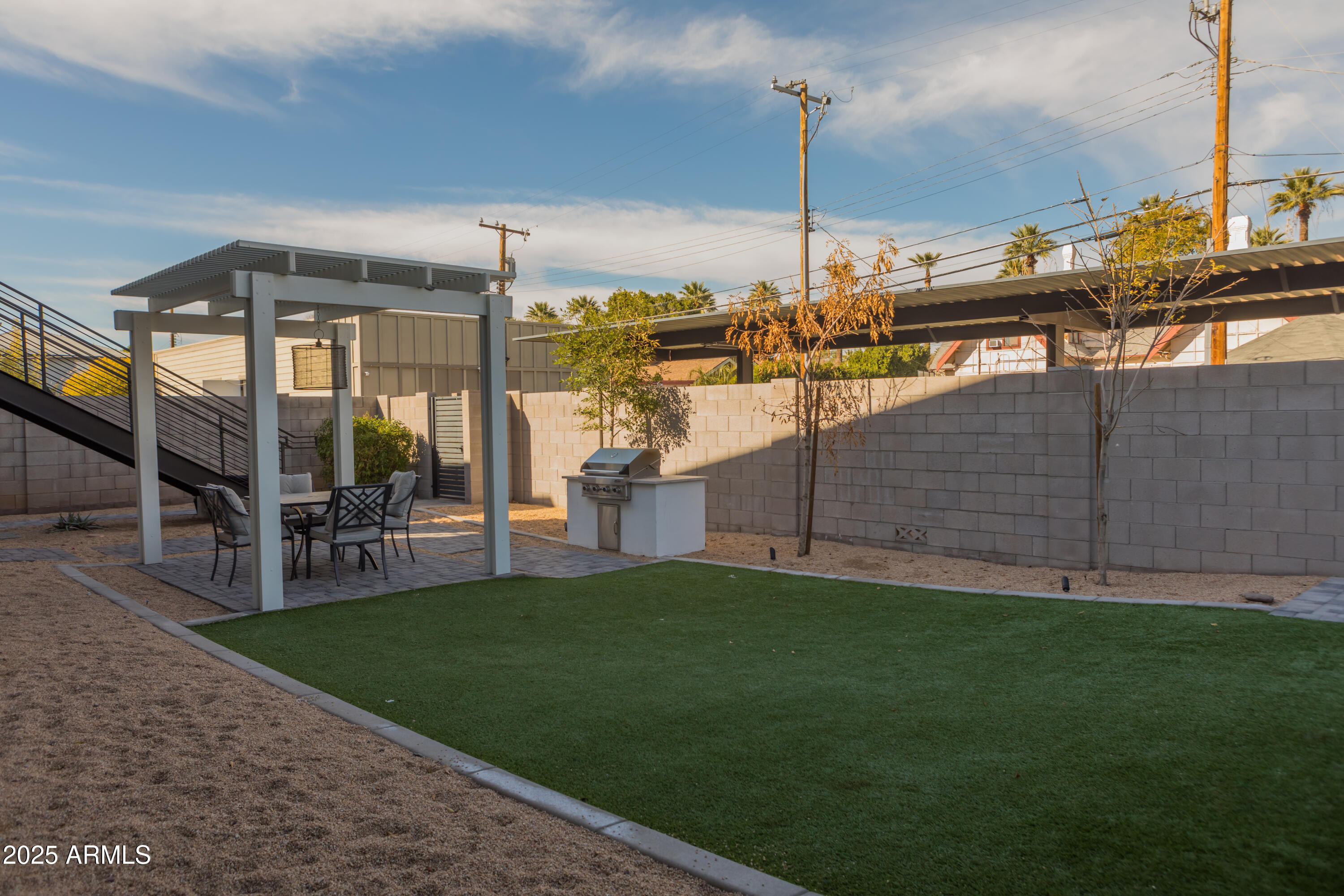 302 West Culver Street, Unit 3 Phoenix, AZ 85003 - Photo 21 of 21 a view of a swimming pool with a yard