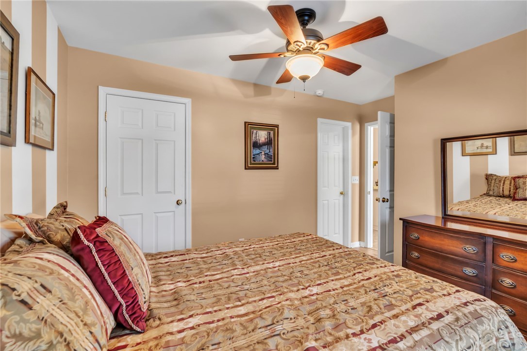 18 Sweetgrass Trail Anderson, SC 29625 - Photo 18 of 26 This cozy bedroom offers a tranquil retreat with practical design elements.