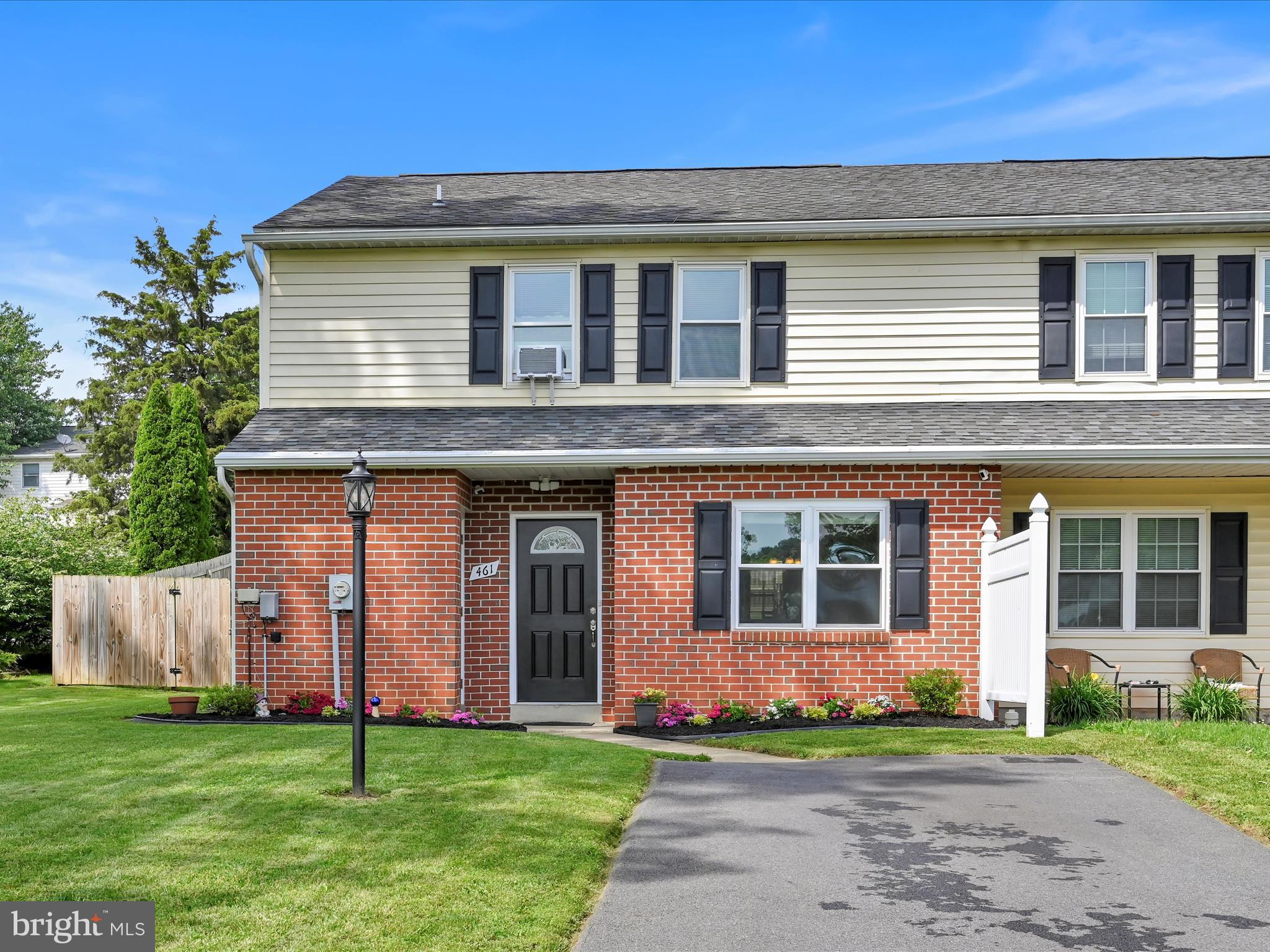 461 Crosswinds Drive Lititz, PA 17543 - Photo 1 of 32 a front view of a house with a garden